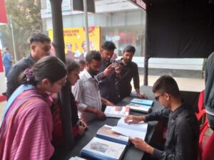 Visitors enjoying Braille reading.